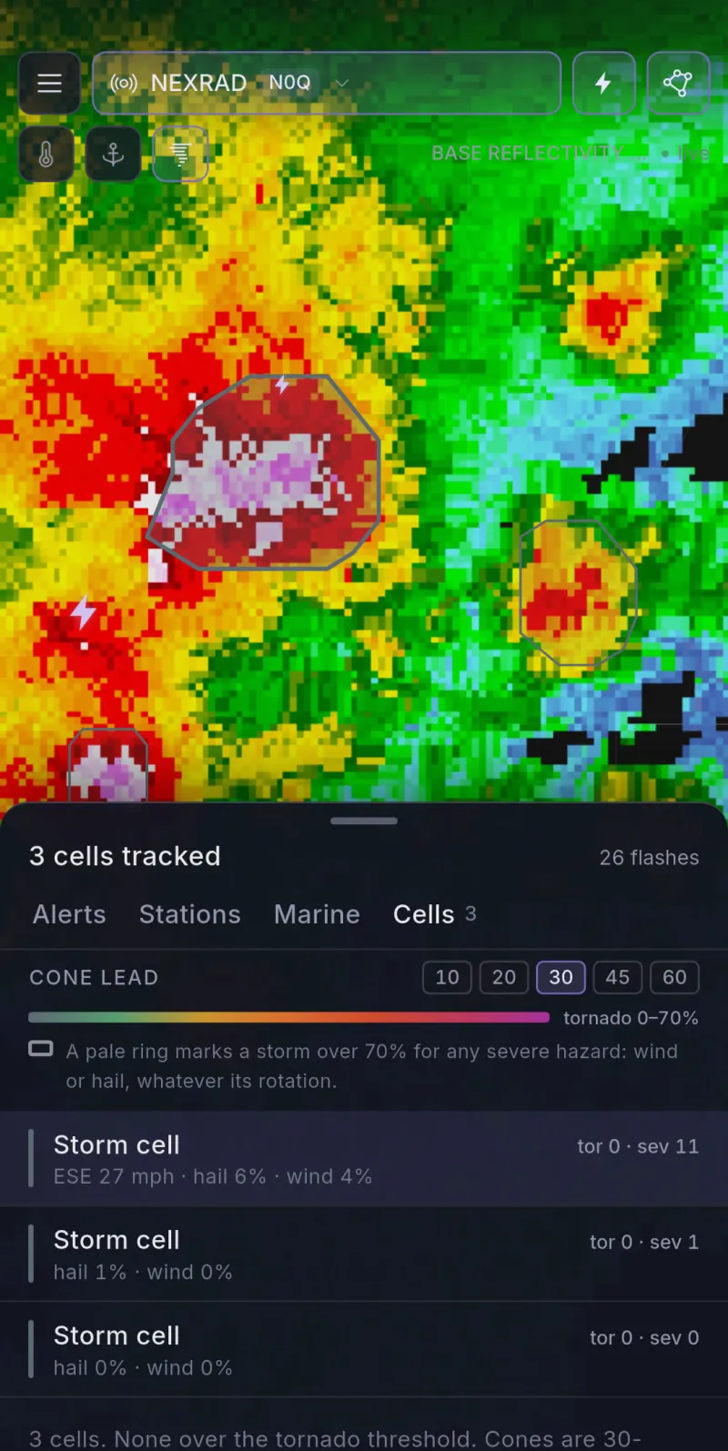The phone app showing Level II reflectivity with tracked storm cells outlined and the cell sheet open.